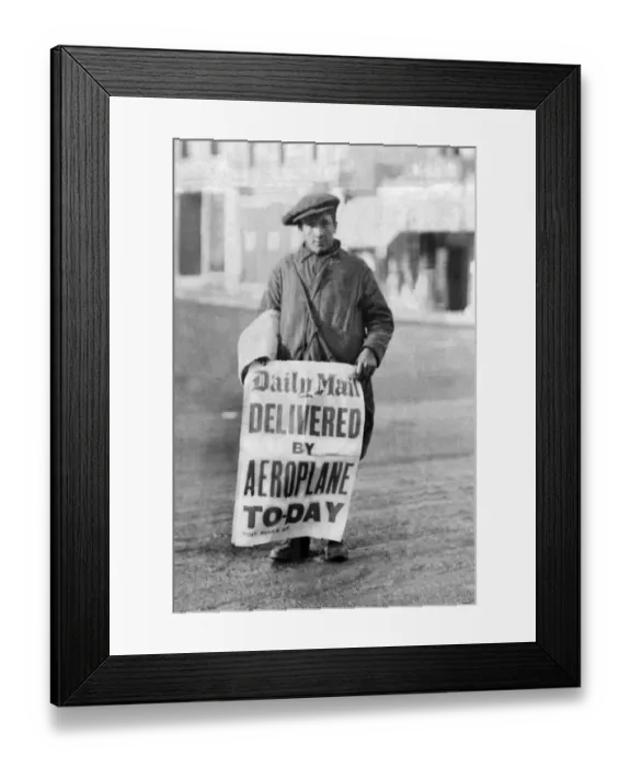 Framed Print : A newspaper boy with a sign Framed Print : A newspaper boy with a sign