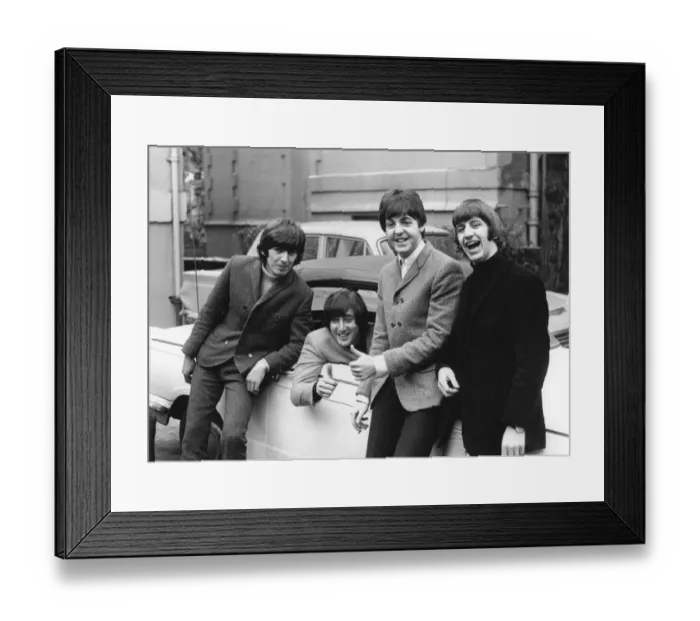 Framed Print : John Lennon passes his driving test 1965 Framed Print : John Lennon passes his driving test 1965