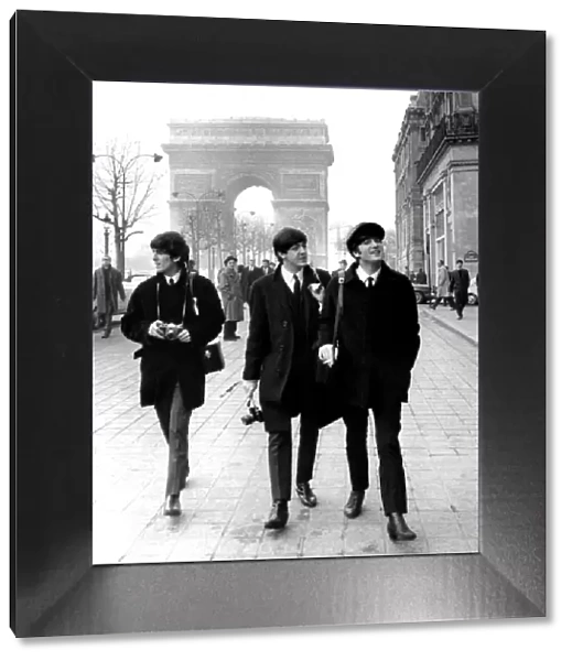 TheBeatles in Paris in front of the Arc de Triomphe