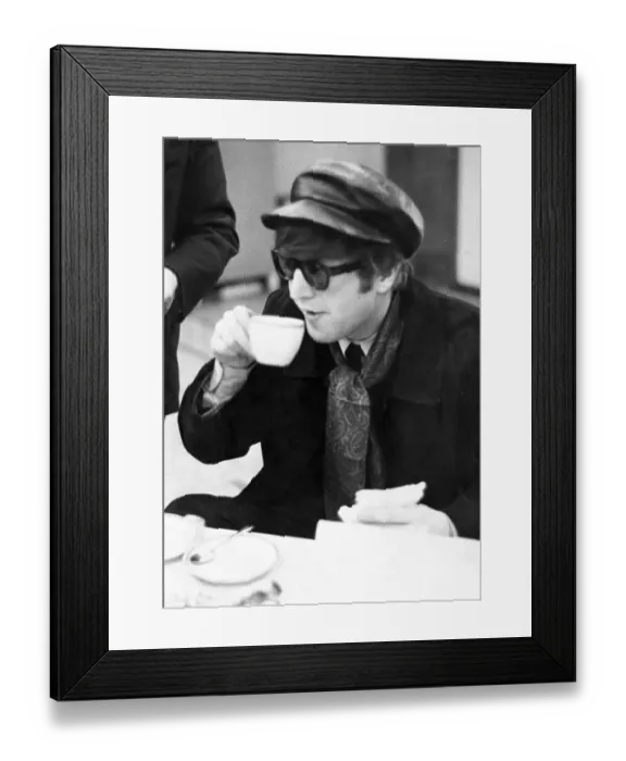 Framed Print : John Lennon has a cup of tea 1964 Framed Print : John Lennon has a cup of tea 1964