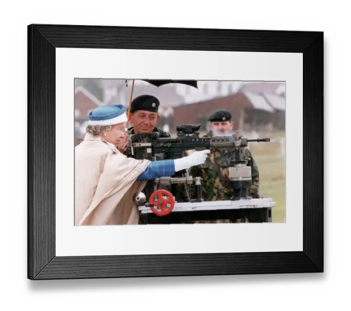 Framed Print : The Queen with a gun Framed Print : The Queen with a gun