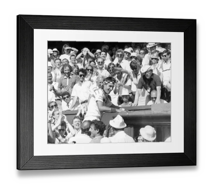 Framed Print : Pat Cash climbs into the crowd to greet his family