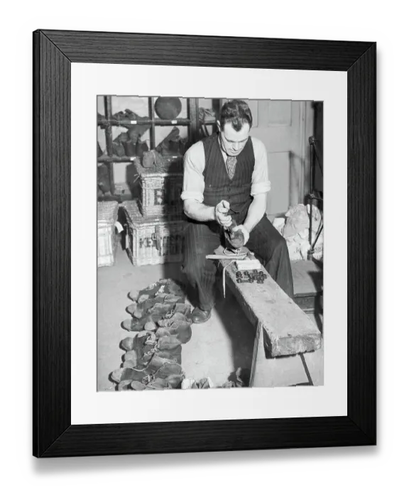 Framed Print : Charlton Athletic trainer Jimmy Trotter replaces the studs teams football boots 1945 Framed Print : Charlton Athletic trainer Jimmy Trotter replaces the studs teams football boots 1945