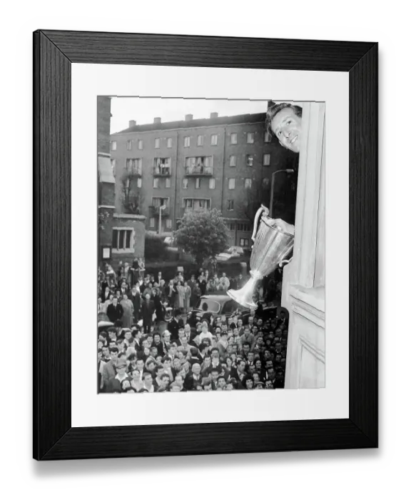 Framed Print : Tony Marchi waves the European Cup Winners Cup trophy from the Tottenham boardroom window 1963 Framed Print : Tony Marchi waves the European Cup Winners Cup trophy from the Tottenham boardroom window 1963