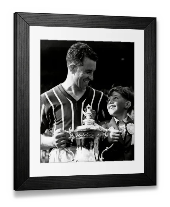 Framed Print : Manchester City Footballer Roy Paul after FA cup final with his son Robert 1956 Framed Print : Manchester City Footballer Roy Paul after FA cup final with his son Robert 1956