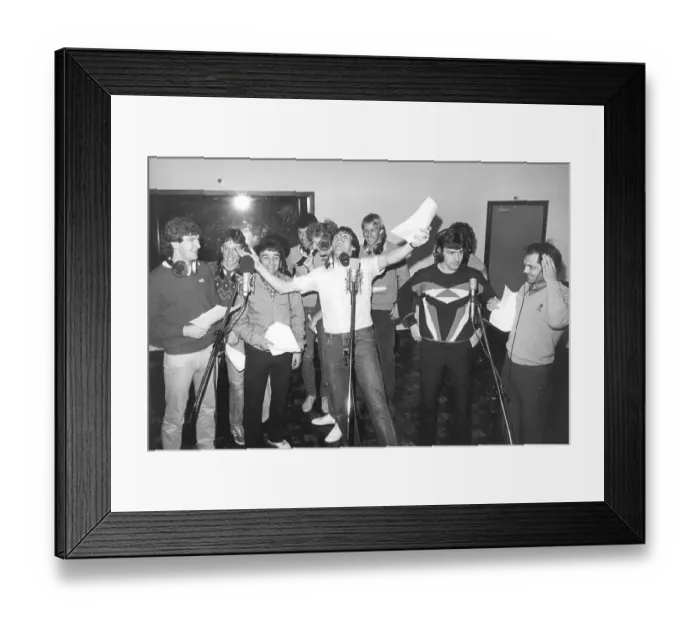 Framed Print : Frank Stapleton and his his Manchester United team mates recording a song 1983 Framed Print : Frank Stapleton and his his Manchester United team mates recording a song 1983