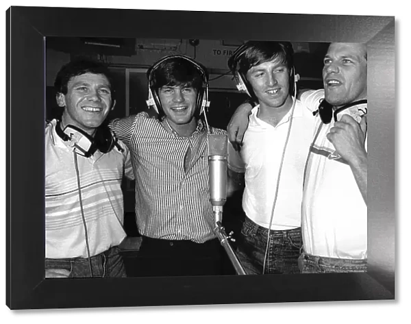 Everton footballers (L-R) Peter Reid, Graeme Sharp, Gary Stevens and Andy Gray, recording Everton football team's FA Cup Final song at Abbey Road
