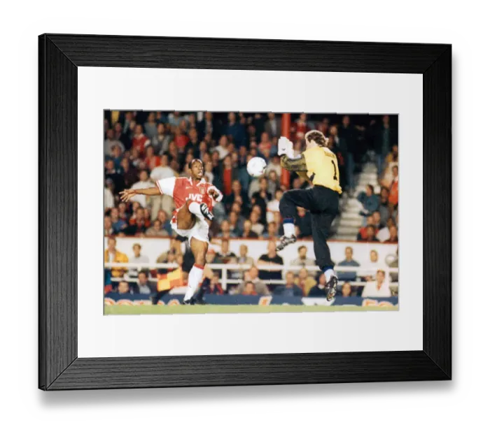 Framed Print : Ian Wright scores past keeper Dmitri Kharine. 1996