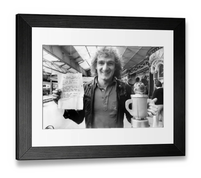 Framed Print : Liverpool Footballer Phil Thompson with the Mickey Mouse Cup and letter presented to him before League Cup final by Everton fan Framed Print : Liverpool Footballer Phil Thompson with the Mickey Mouse Cup and letter presented to him before League Cup final by Everton fan