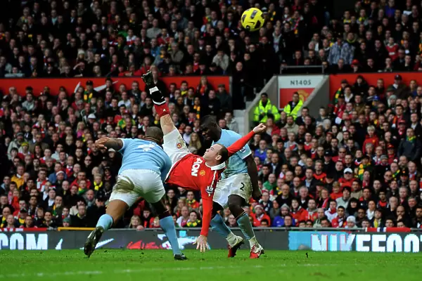 Manchester United footballer Wayne Rooney scoring an overhead kick against Manchester City