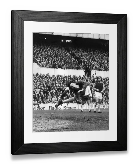 Framed Print : Mervyn Day, West Ham goalkeeper saves against Tottenham, Frank Lampard snr looks on Framed Print : Mervyn Day, West Ham goalkeeper saves against Tottenham, Frank Lampard snr looks on
