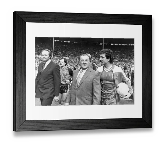 Framed Print : Bob Paisley leads the Liverpool squad on to the pitch at Wembley alongside Ron Atkinson, manager of Manchester United 1983 Framed Print : Bob Paisley leads the Liverpool squad on to the pitch at Wembley alongside Ron Atkinson, manager of Manchester United 1983