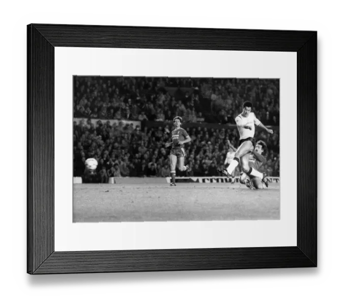 Framed Print : Manchester United's Paul McGrath scores as Mark Lawrenson challenges Framed Print : Manchester United's Paul McGrath scores as Mark Lawrenson challenges
