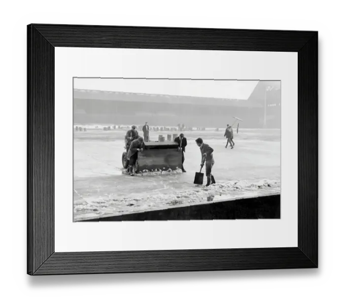 Framed Print : Groundsmen attempting to rid the pitch of ice at Anfield, during the bad winter of 1962 / 1963 Framed Print : Groundsmen attempting to rid the pitch of ice at Anfield, during the bad winter of 1962 / 1963