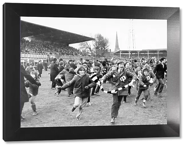 The Hereford crowd invade the pitch after non-league Hereford beat Newcastle in the FA Cup 3rd Round 1972