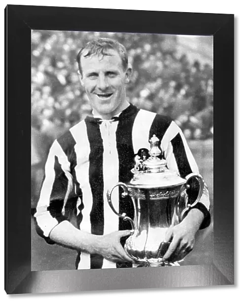 Frank Hudspeth captain of Newcastle United holding the F.A. cup