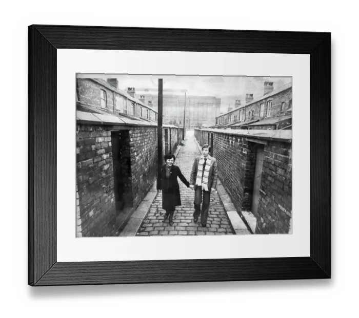 Framed Print : Kazimierz Deyna Polish footballer with his wife Mariola, on a street in front of Manchester City Football Ground, Maine Road 1978 Framed Print : Kazimierz Deyna Polish footballer with his wife Mariola, on a street in front of Manchester City Football Ground, Maine Road 1978