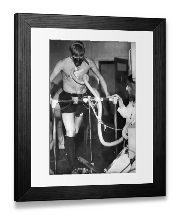 Framed Print : Colin Bell, undergoing experiments to discover how he generates power Framed Print : Colin Bell, undergoing experiments to discover how he generates power