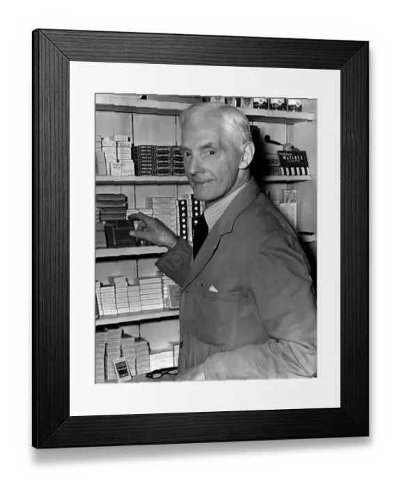Framed Print : Jimmy Howie, ex-Newcastle United footballer, behind the counter in his shop Framed Print : Jimmy Howie, ex-Newcastle United footballer, behind the counter in his shop