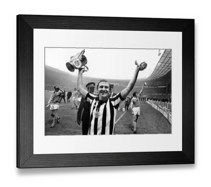 Framed Print : Dennis Tueart of Newcastle United with the League Cup