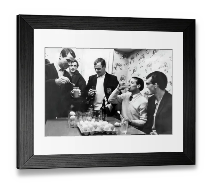 Framed Print : Swansea players preparing for their fourth round in the FA cup with Arsenal by drinking sherry and eggs Framed Print : Swansea players preparing for their fourth round in the FA cup with Arsenal by drinking sherry and eggs