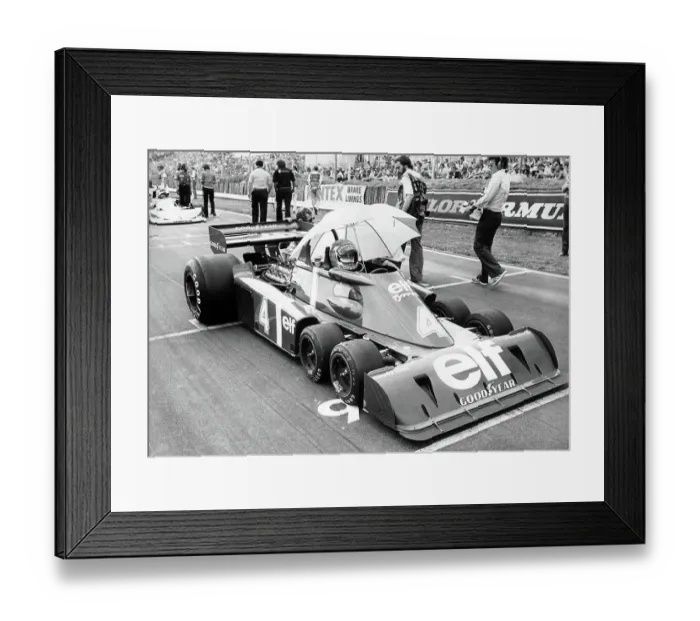 Framed Print : Racing driver Patrick Depailler in his 6 wheel Elf Tyrrell at Brands Hatch for the 1976 Grand Prix Framed Print : Racing driver Patrick Depailler in his 6 wheel Elf Tyrrell at Brands Hatch for the 1976 Grand Prix