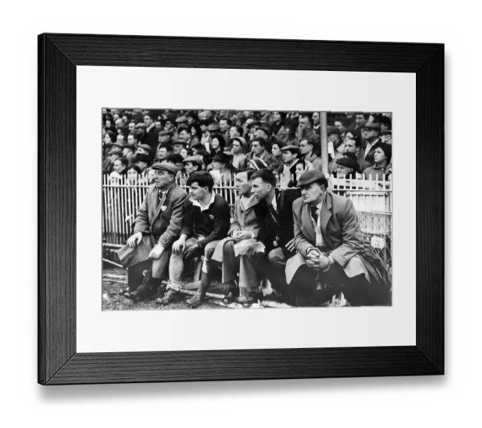 Framed Print : Rugby International 1961. Injured Cyril Davies sits on the touchline bench as Wales battle to victory Framed Print : Rugby International 1961. Injured Cyril Davies sits on the touchline bench as Wales battle to victory