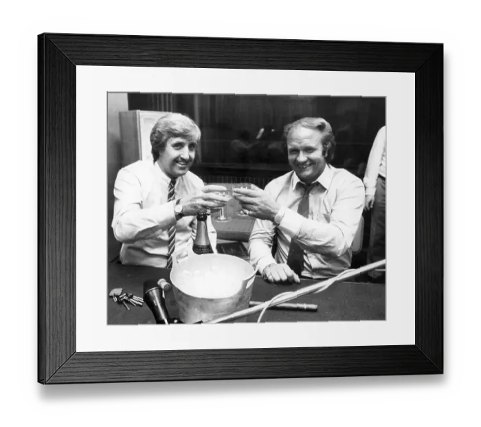 Framed Print : John Bond, manager of Manchester City FC drinks champagne with Ron Atkinson, manger of Manchester United, 1981 Framed Print : John Bond, manager of Manchester City FC drinks champagne with Ron Atkinson, manger of Manchester United, 1981
