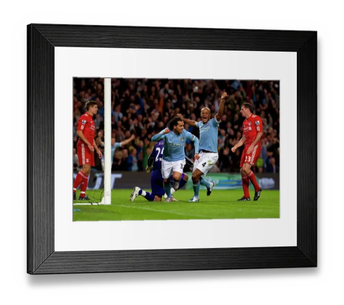 Framed Print : Carlos Tevez scores the second goal and Vincent Kompany celebrates Manchester City v Liverpool (3-0)