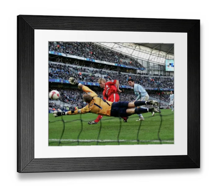 Framed Print : Dirk Kuyt scores Liverpool's winner against Manchester City