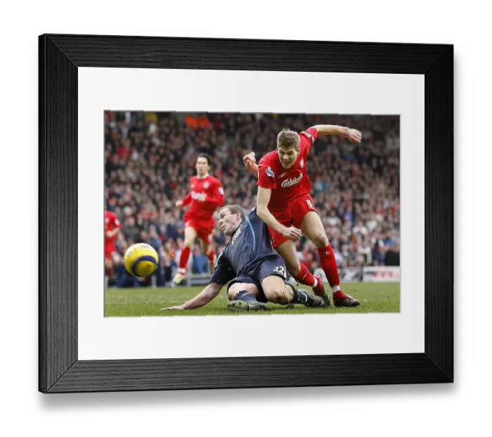 Framed Print : Liverpool's Steve Gerrard is tackled by Manchester City's Richard Dunne Framed Print : Liverpool's Steve Gerrard is tackled by Manchester City's Richard Dunne