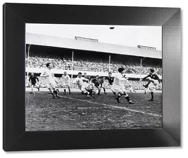 Ireland v England Rugby Jack Kyle (Ireland) kicks down field after a scrum. Ireland won 14-5 1949