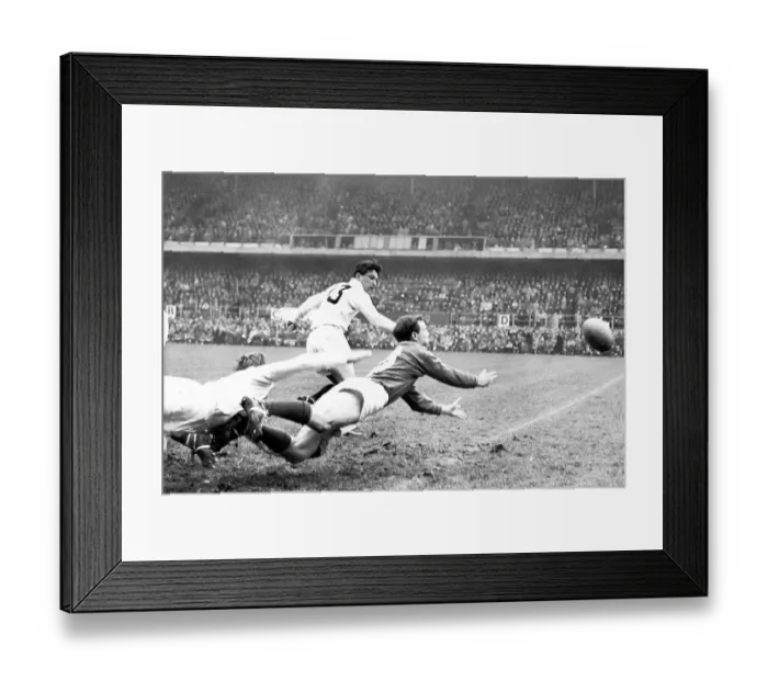 Framed Print : Andy Mulligan (dark shirt) passes the ball in the Ireland v England (0-3) match at Lansdowne Road in the Five Nations Championship 1959 Framed Print : Andy Mulligan (dark shirt) passes the ball in the Ireland v England (0-3) match at Lansdowne Road in the Five Nations Championship 1959