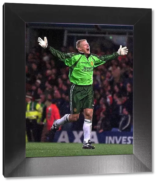 Peter Schmeichel celebrates after saving penalty