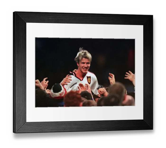 Framed Print : Manchester United's David Beckham is chaired off the Villa Park by fans after their extra-time win against Arsenal, in FA Cup semi-final replay 1999 Framed Print : Manchester United's David Beckham is chaired off the Villa Park by fans after their extra-time win against Arsenal, in FA Cup semi-final replay 1999