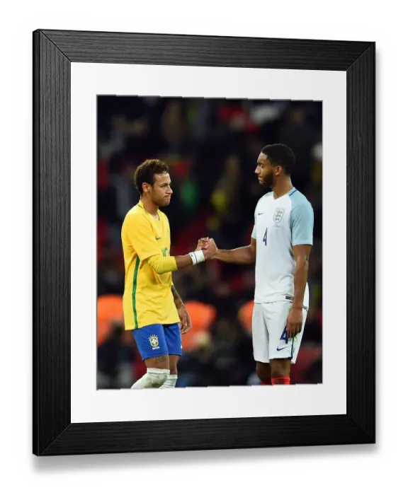 Framed Print : England v Brazil, friendly at Wembley Stadium, London Neymar and Joe Gomez shake hands at the end of the game