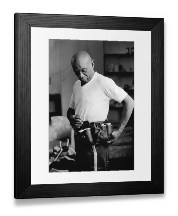 Framed Print : Brazilian football team trainer, Mario America, checking his medical belt Framed Print : Brazilian football team trainer, Mario America, checking his medical belt