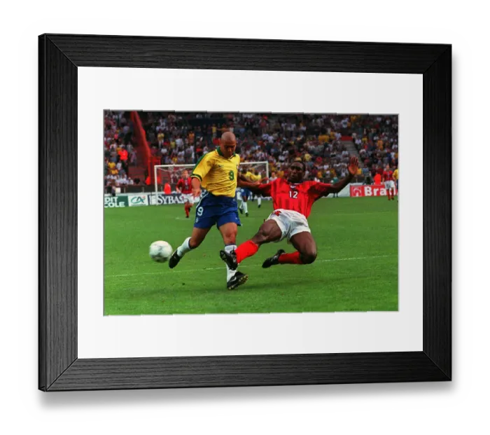 Framed Print : Sol Campbell tackles Ronaldo England v Brazil 1997