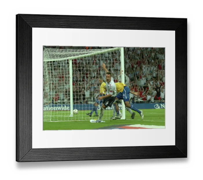 Framed Print : England's John Terry scores and celebrates England v Brazil 1-1 at Wembley Stadium 2007 Framed Print : England's John Terry scores and celebrates England v Brazil 1-1 at Wembley Stadium 2007