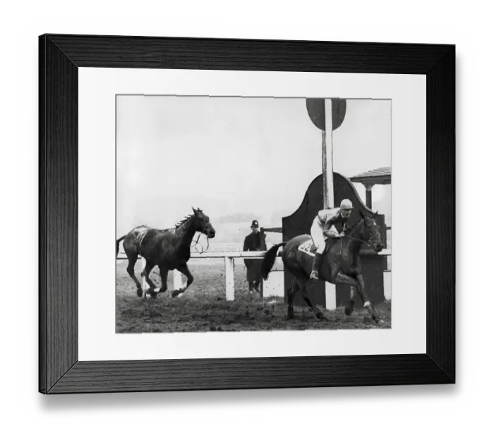 Framed Print : The 1928 Grand National winner Tipperary Jim passes the post