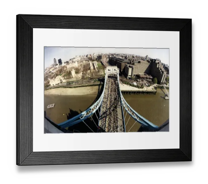 Framed Print : An aerial view from Tower Bridge of the 1996 London Marathon Framed Print : An aerial view from Tower Bridge of the 1996 London Marathon