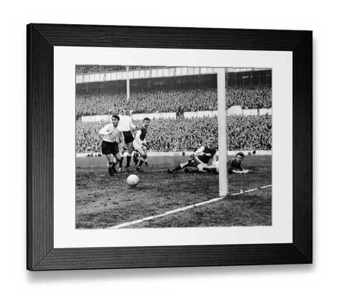 Framed Print : Spur's Laurie Brown watches his shot hit the post as Arsenal's keeper Jim McClelland and centre-half Ian Ure look on Framed Print : Spur's Laurie Brown watches his shot hit the post as Arsenal's keeper Jim McClelland and centre-half Ian Ure look on