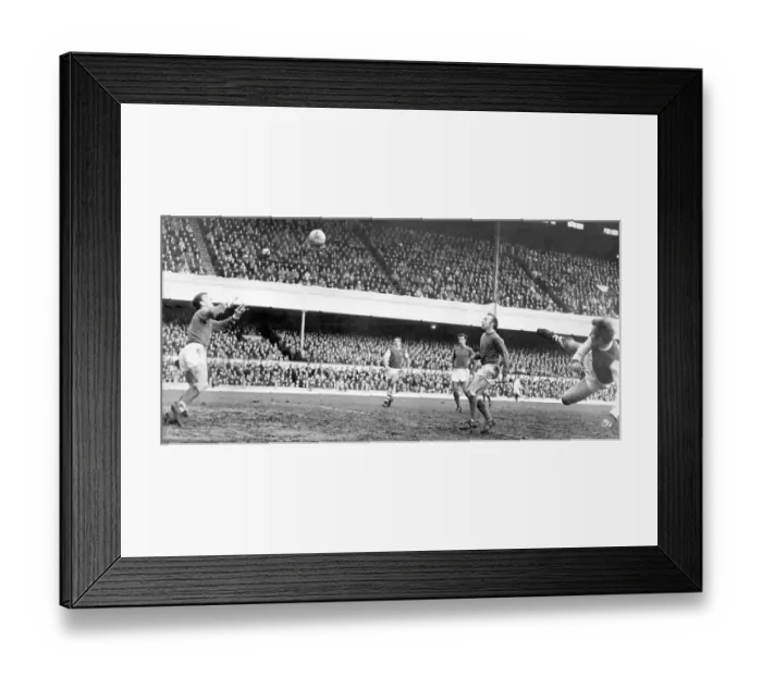Framed Print : Arsenal v Manchester United, at Highbury. David Court about to score with a diving header 1968 Framed Print : Arsenal v Manchester United, at Highbury. David Court about to score with a diving header 1968