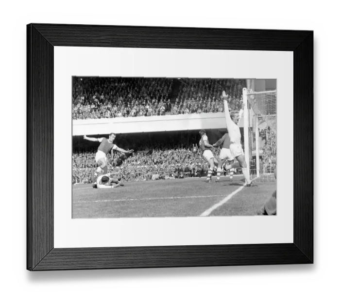 Framed Print : David Herd scores with a header for United. Denis Law celebrates Arsenal v Manchester United 1962 Framed Print : David Herd scores with a header for United. Denis Law celebrates Arsenal v Manchester United 1962