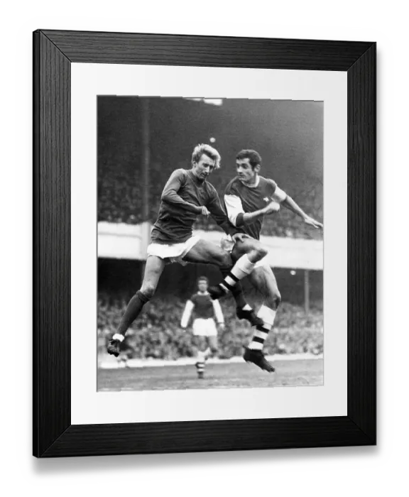 Framed Print : Denis Law (left) of Manchester United, in action against Frank McLintock of Arsenal Framed Print : Denis Law (left) of Manchester United, in action against Frank McLintock of Arsenal