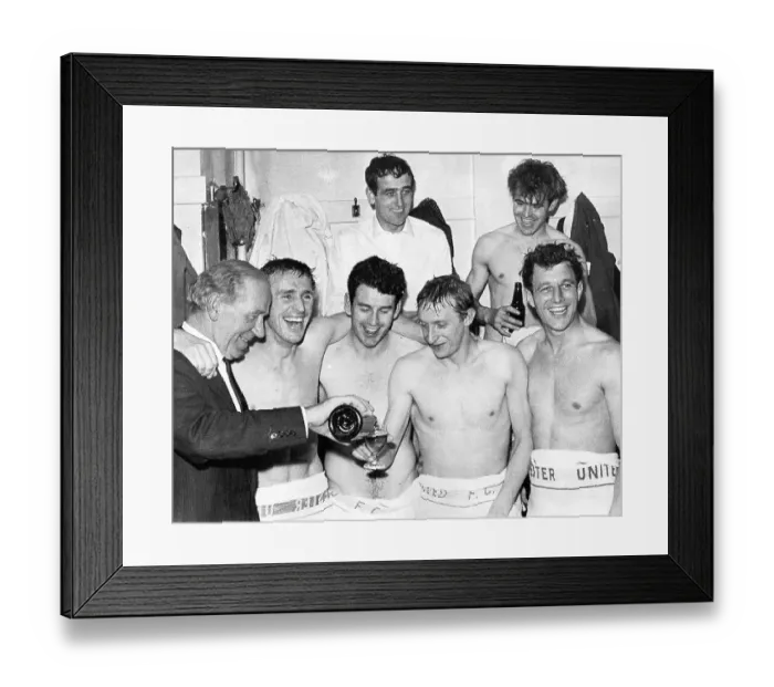 Framed Print : United's manager Matt Busby pours champagne for Denis Law as Pat Crerand, Pat Dunn and David Herd (1934-2016), with at the rear Shay Brennan and John Connelly look on Framed Print : United's manager Matt Busby pours champagne for Denis Law as Pat Crerand, Pat Dunn and David Herd (1934-2016), with at the rear Shay Brennan and John Connelly look on