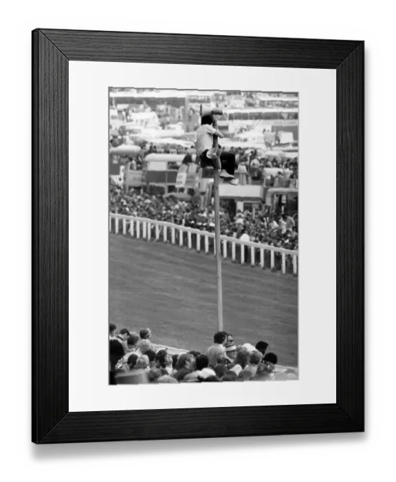 Framed Print : The Derby - 1983 - A spectator climbs to get a better view Framed Print : The Derby - 1983 - A spectator climbs to get a better view