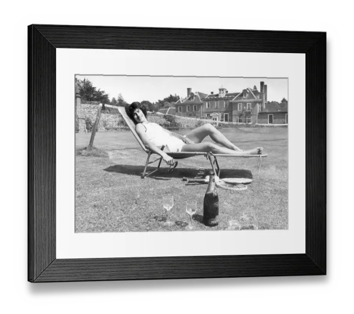Framed Print : Tennis Player Virginia Wade relaxing in the sun at home in Kent after her Wimbledon win 1977 Framed Print : Tennis Player Virginia Wade relaxing in the sun at home in Kent after her Wimbledon win 1977