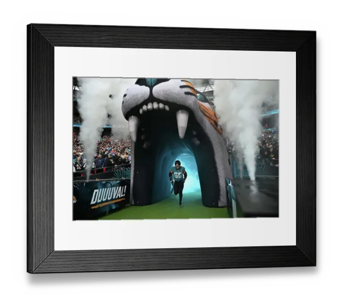 Framed Print : Mitch Morse runs out at the start of the game Jacksonville Jaguars v New England Patriots. Wembley stadium, London 2024 Framed Print : Mitch Morse runs out at the start of the game Jacksonville Jaguars v New England Patriots. Wembley stadium, London 2024