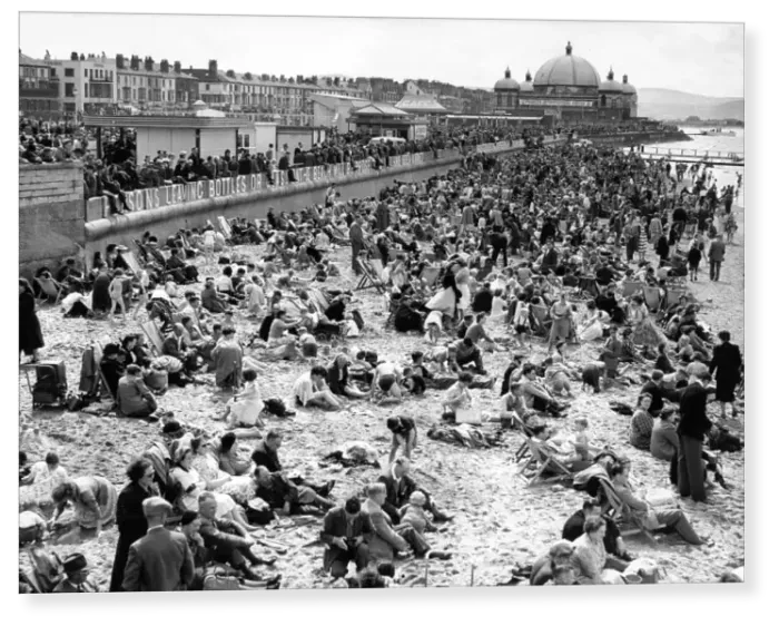 Print : Rhyl, holidaymakers on the beach 1954
